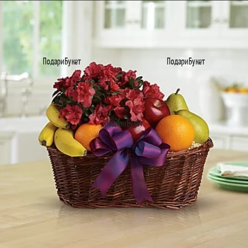 Send a basket with fruits and azalea potted plant.