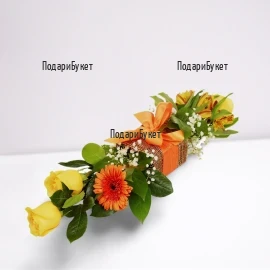 Modern arrangement of gerberas and roses