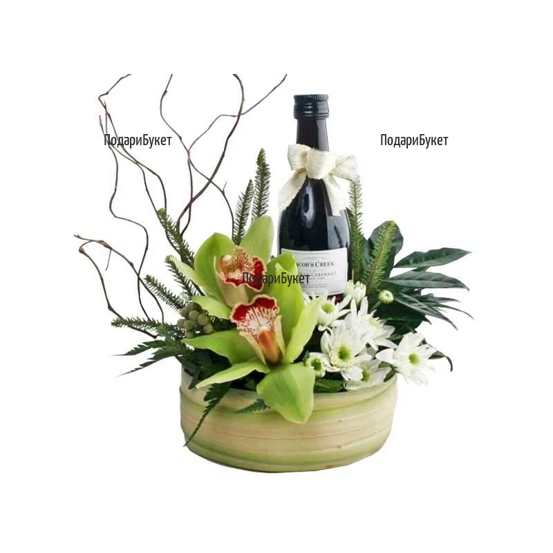 Stylish arrangement with orchids and wine
