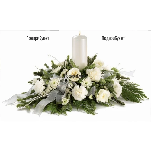 Order and deliver white Christmas arrangement with one candle by courier