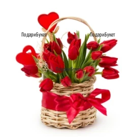 Romantic basket with red tulips