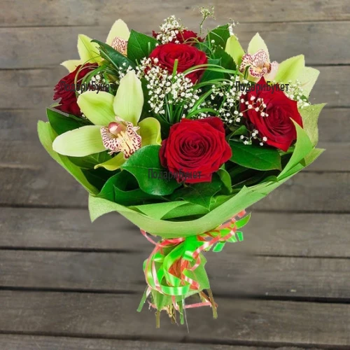 Bouquet of red roses and orchids