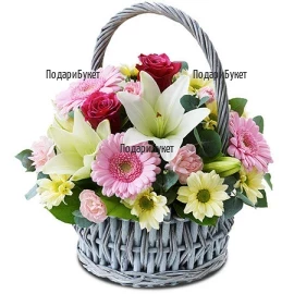 Pretty, cheerful basket with mixed flowers, perfect for special occasions and for relatives