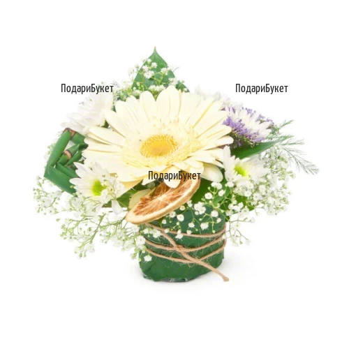 Arrangement with gerbera and greenery