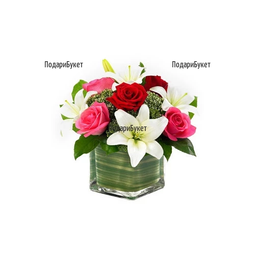 Send arrangement with roses and lilies to Sofia, Plovdiv, Varna