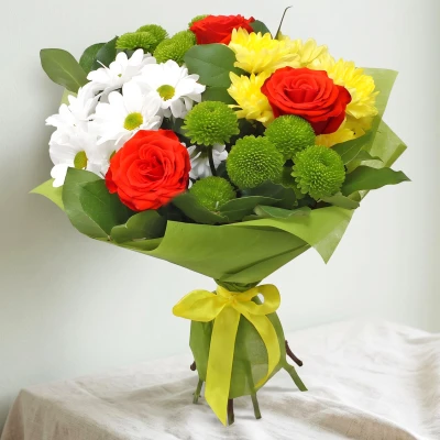 Classic bouquet of various flowers and fresh greenery - vibrant bouquet of aromas and freshness.