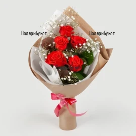 Classic, elongated bouquet of 5 red roses and greenry, wrapped in fancy papers