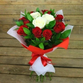 The most ordered bouquet from our flower shop - beautiful bouquet of 8 red and 3 white roses, wrapped in fresh greenery and fancy papers. The bouquet is perfect gift for all occasions.